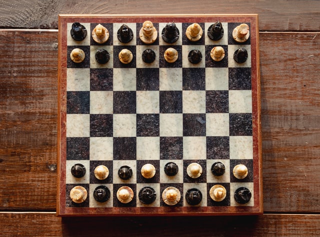 The black-and-white chess board is safer than running while Black in the early NFL